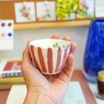 Porcelain cup with a cat