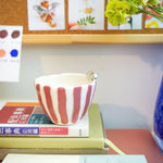 Porcelain cup with a cat