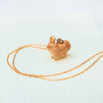 Pomeranian with a star pendant