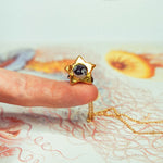 Porpoise with a star pendant