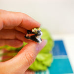 Rabbit with a lilly pendant