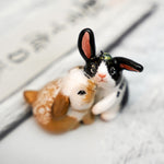Rabbits with roses
