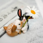 Rabbits with roses