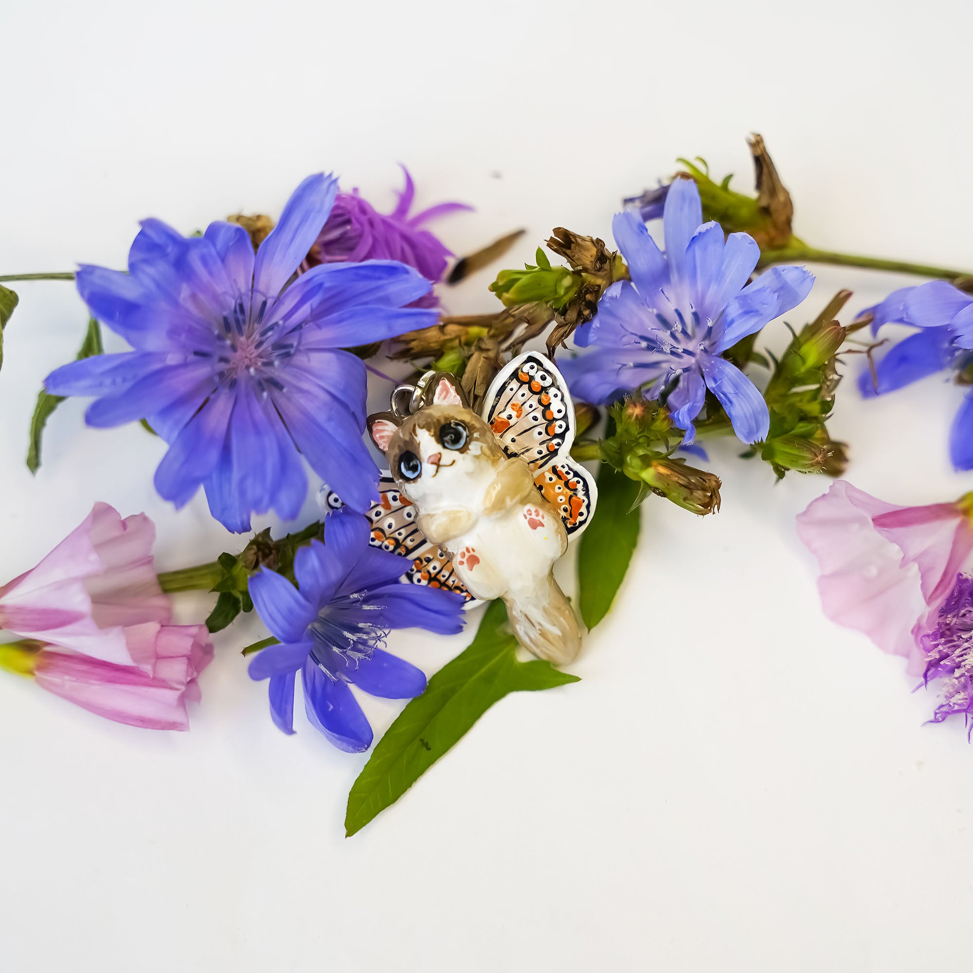 Ragdoll cat with butterfly wings pendant