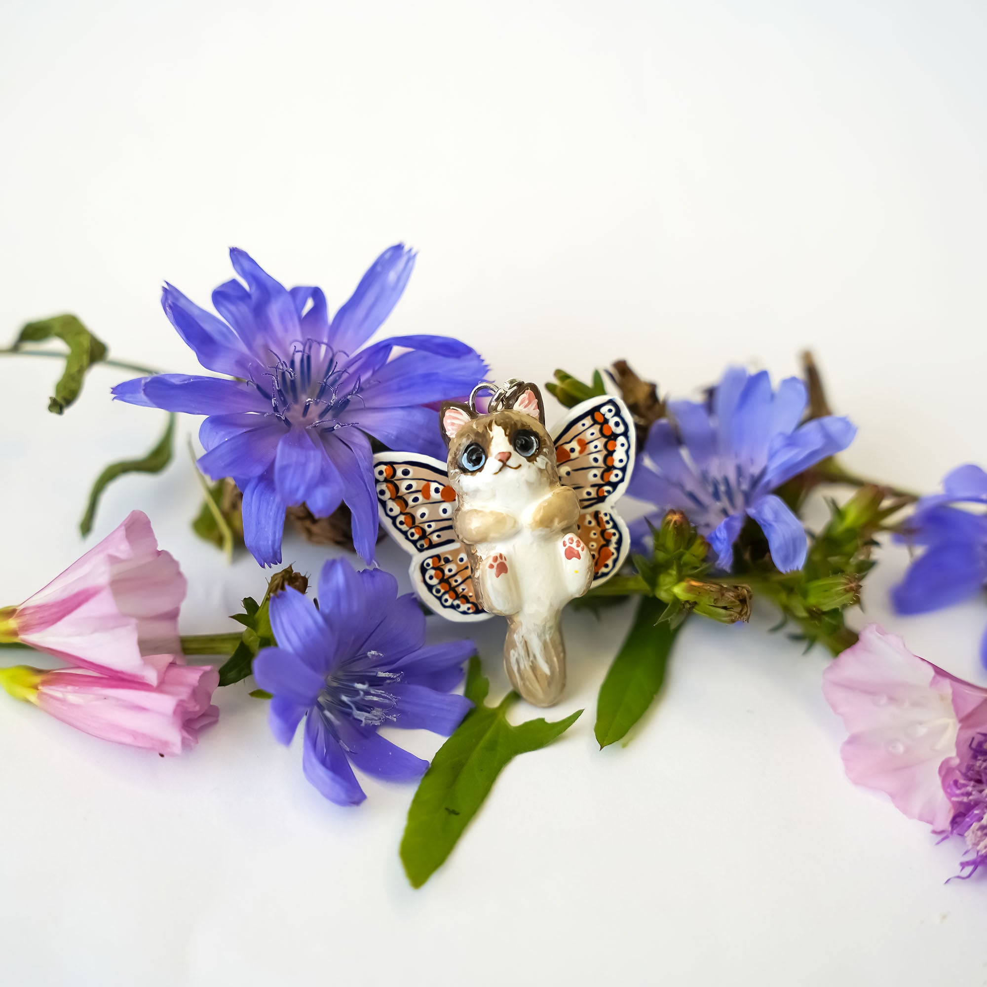 Ragdoll cat with butterfly wings pendant