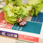 Sakura red panda pendant