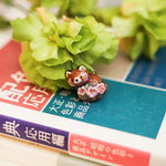 Sakura red panda pendant