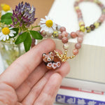 Sakura red panda pendant