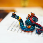 Regal ring-necked snake with butterflies