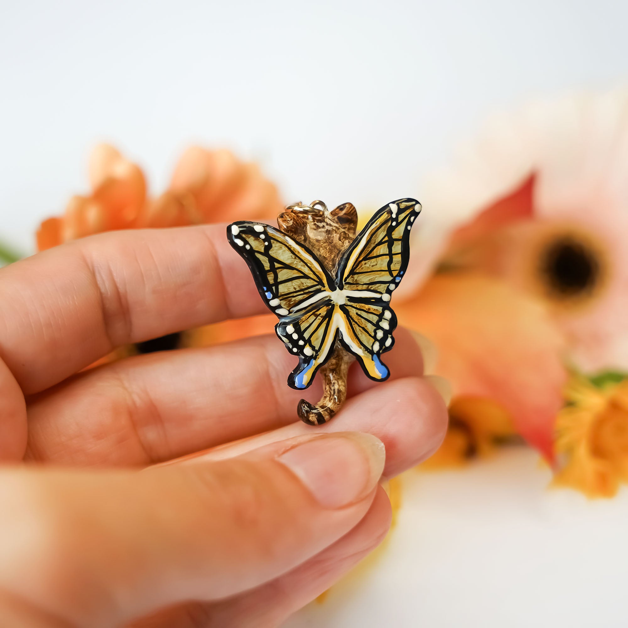 Sand cat with butterfly wings pendant