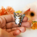 Sand cat with butterfly wings pendant