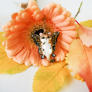 Sand cat with butterfly wings pendant