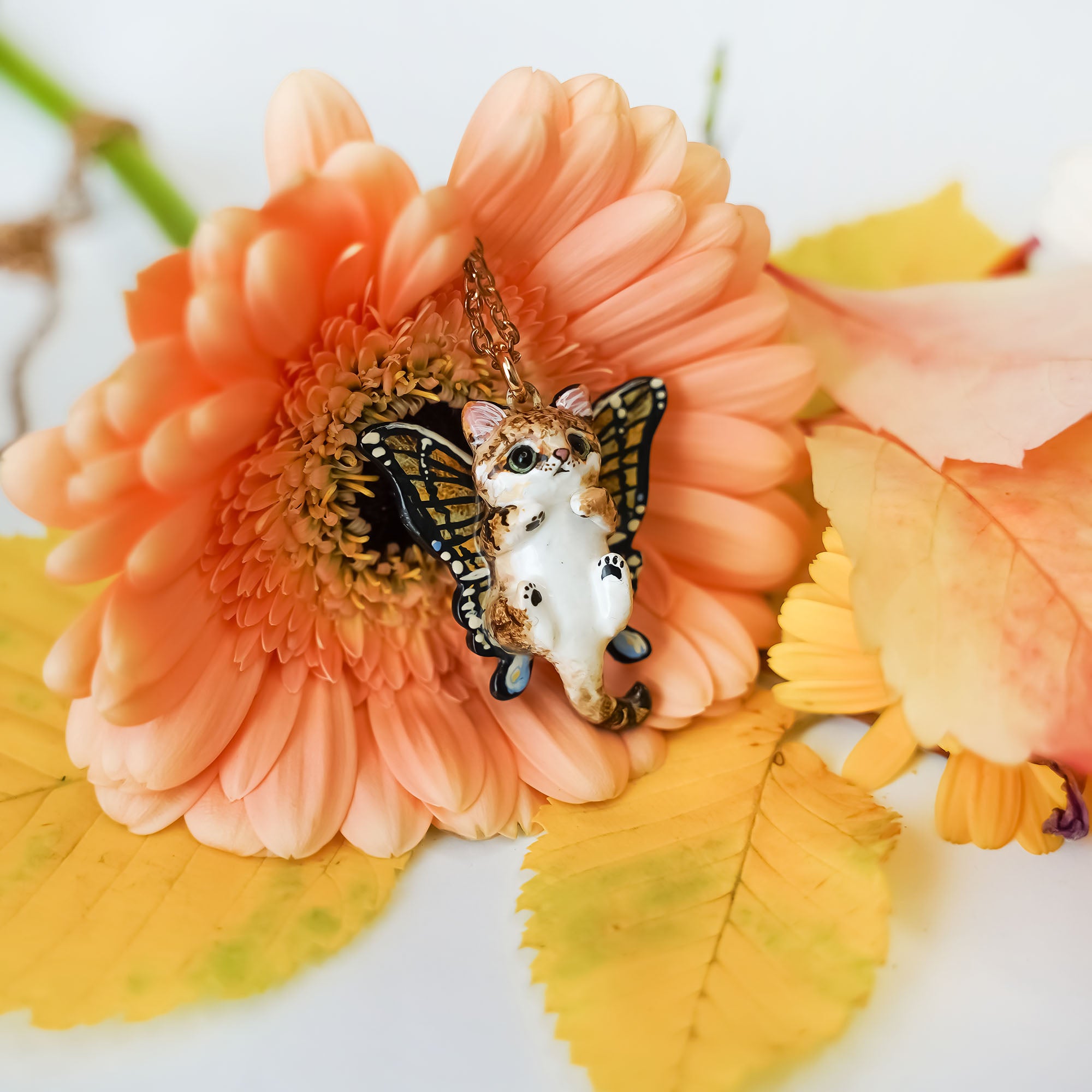 Sand cat with butterfly wings pendant