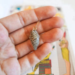 Seal with a heart pendant