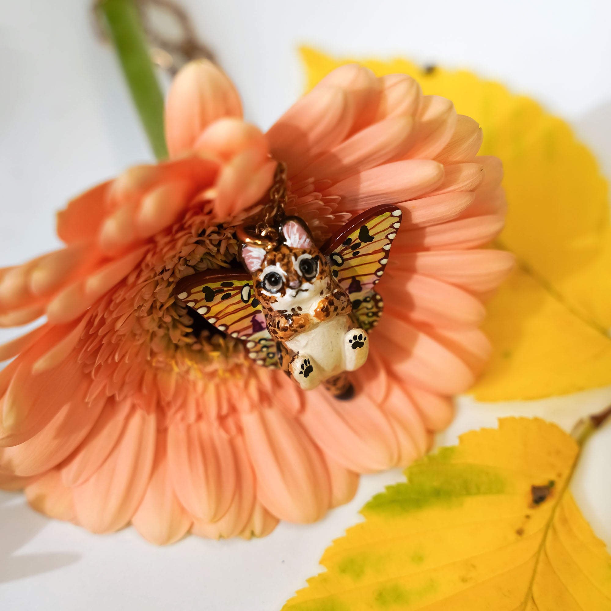 Serval with butterfly wings pendant