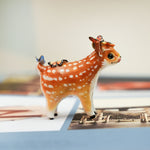 Sika deer with butterflies