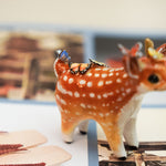 Sika deer with butterflies
