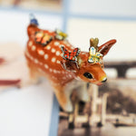Sika deer with butterflies