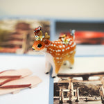 Sika deer with butterflies