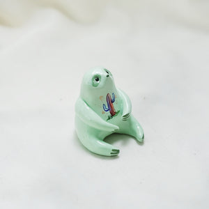 Sloth with hats (UFO and leopard) figurine