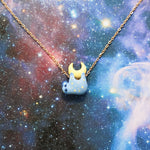 Sloth with the moon pendant