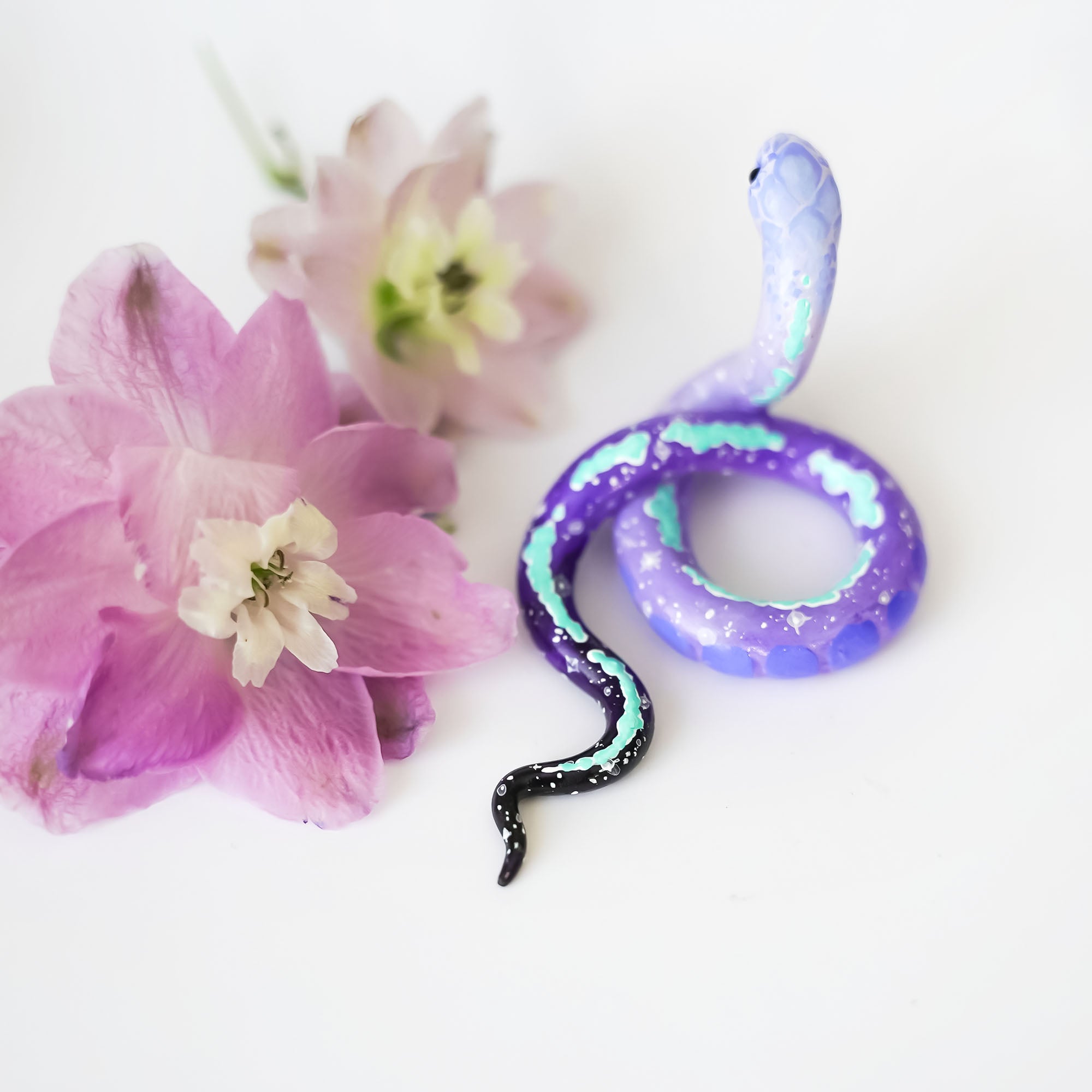 Lilac snake with stars figurine