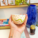 Porcelain cup with snakes