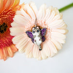 Snow leopard with butterfly wings pendant