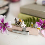 Snow leopard pendant
