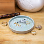 Ceramic jewelry tray with a Snow Leopard
