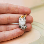 Snow Leopard with the gold Moon pendant