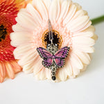 Snow leopard with butterfly wings pendant