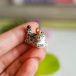 Snow leopard pendant