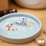 Ceramic jewelry tray with a Snow Leopard
