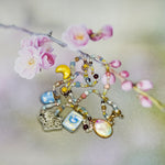 Snow leopard with wings - necklace with charms