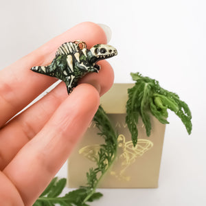Spinosaurus fossil pendant