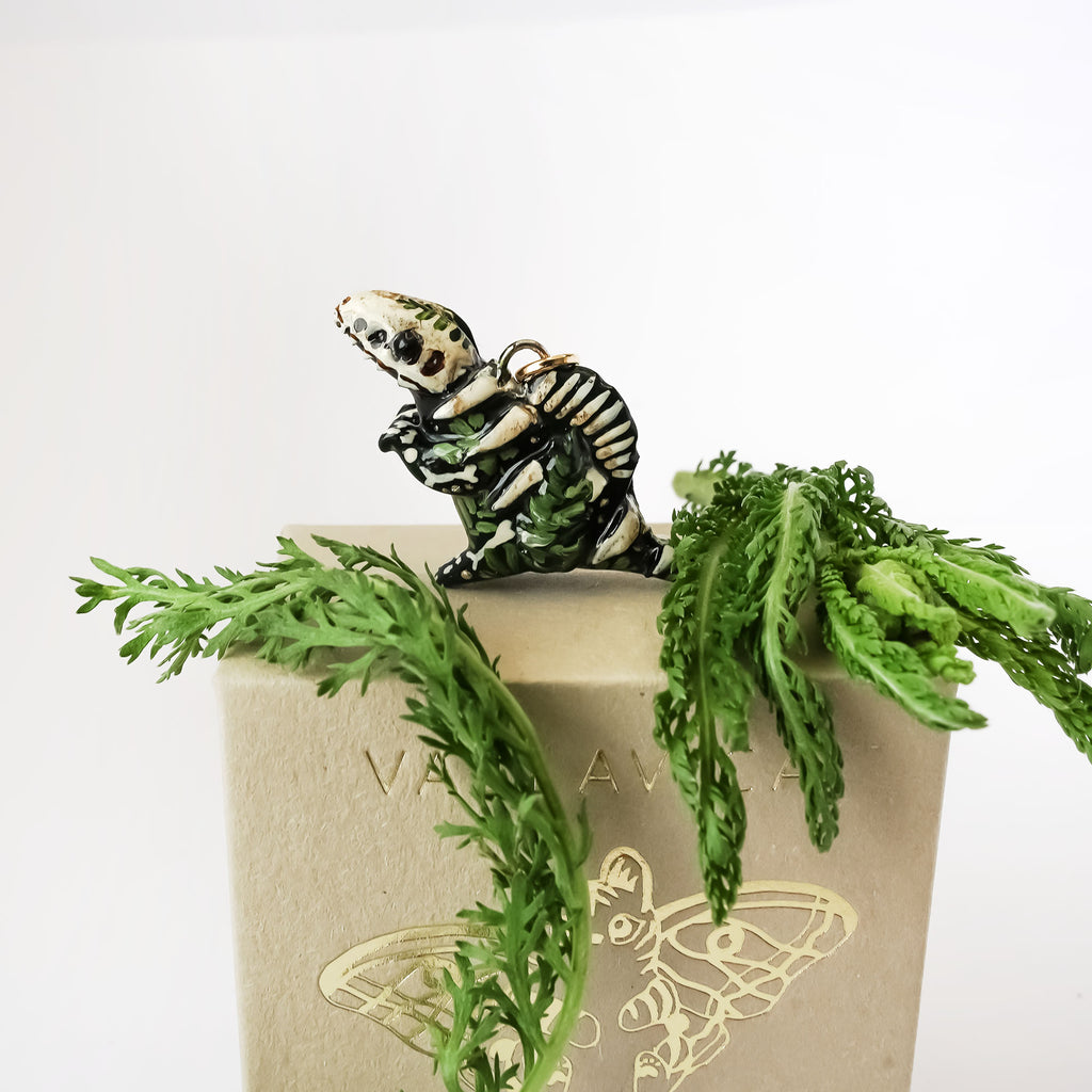 Spinosaurus fossil pendant