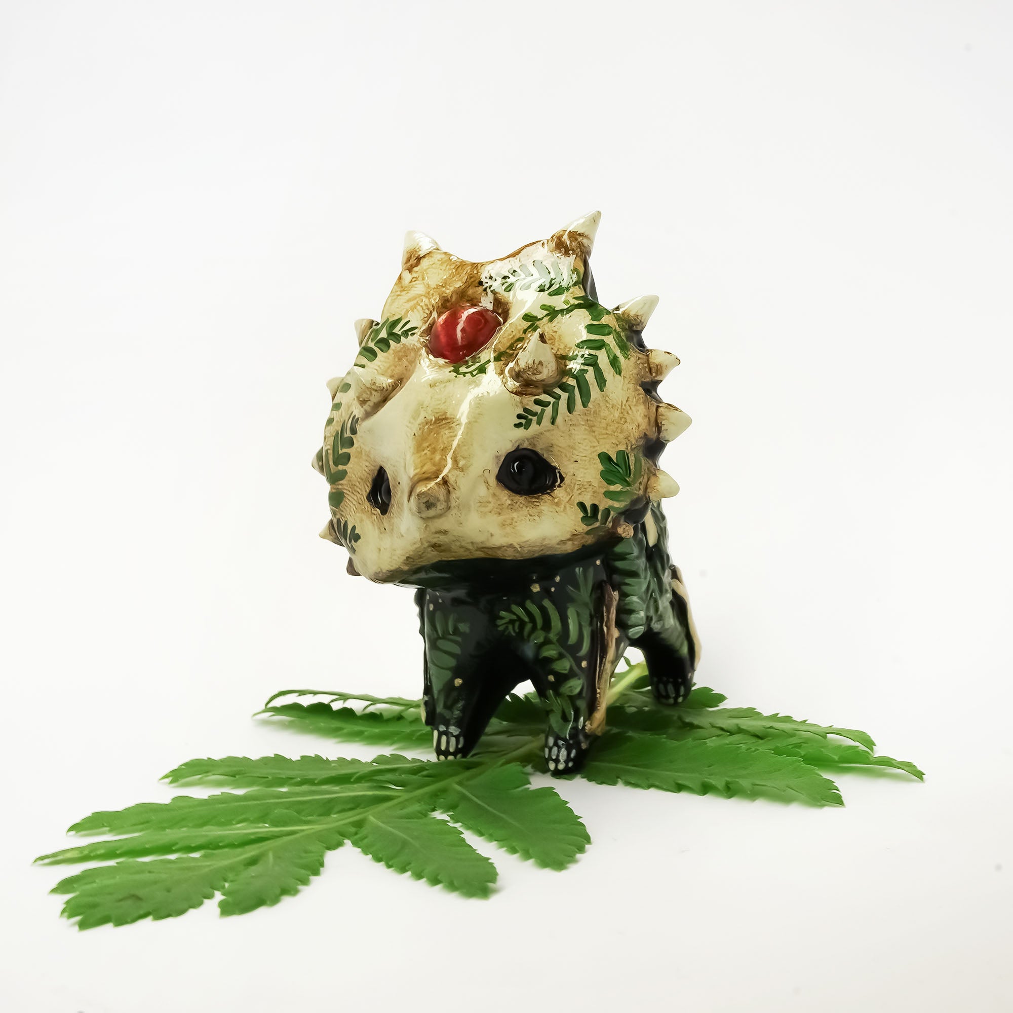 Styracosaurus with sunstone fossil figurine