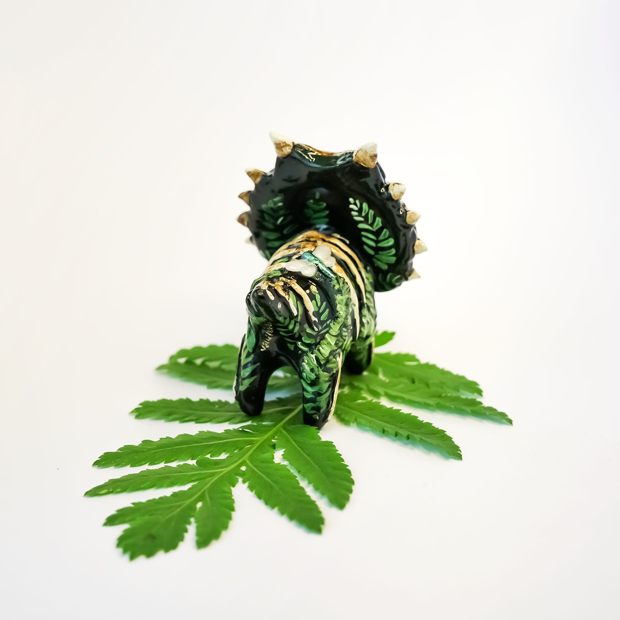 Styracosaurus with sunstone fossil figurine
