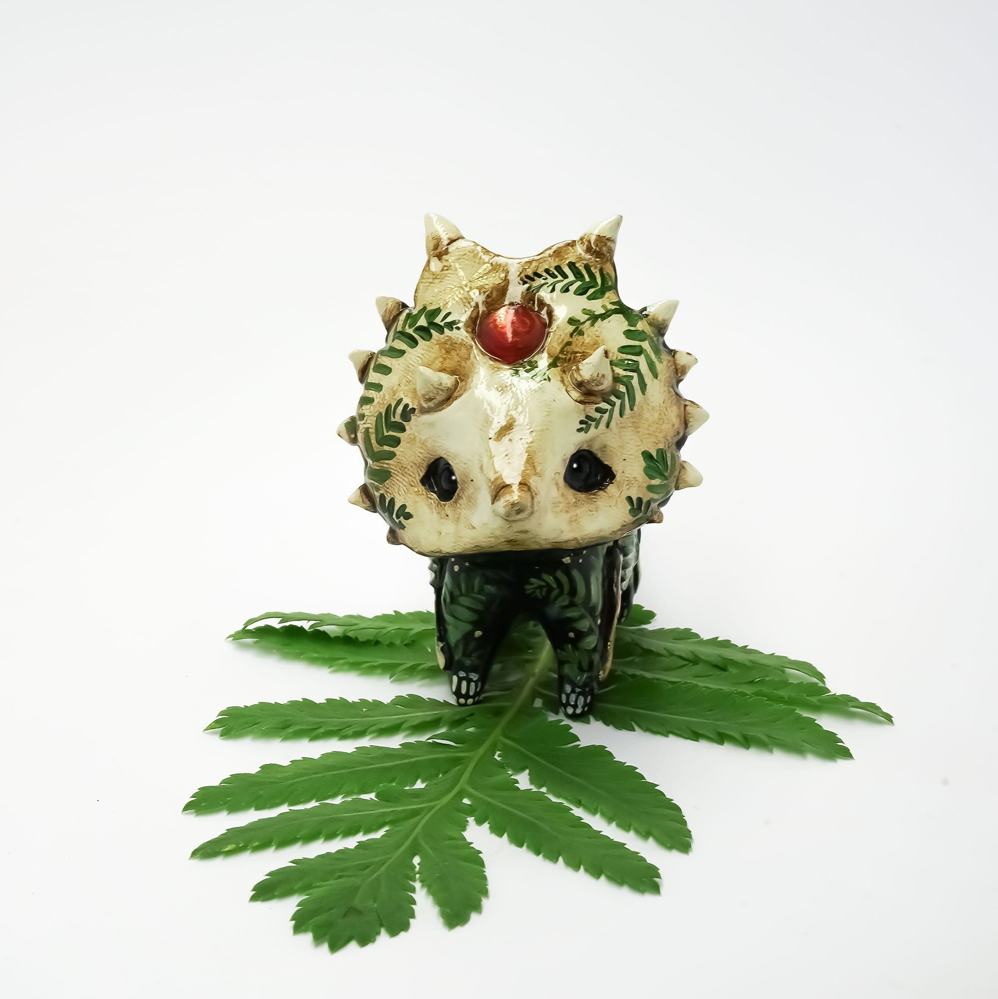Styracosaurus with sunstone fossil figurine