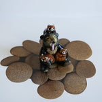 Sun bear with red pandas! figurine