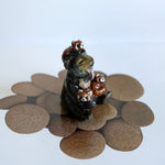Sun bear with red pandas! figurine