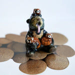Sun bear with red pandas! figurine