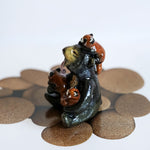 Sun bear with red pandas! figurine