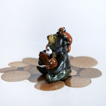 Sun bear with red pandas! figurine