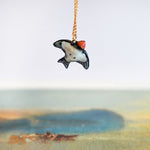 Swallow with a star pendant