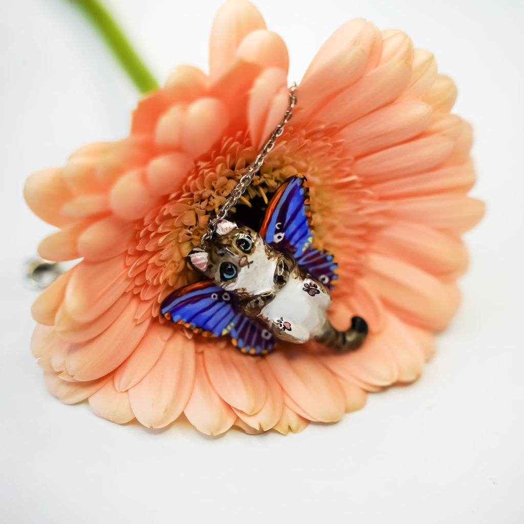 Tabby cat with moth wings pendant