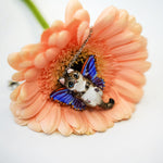 Tabby cat with moth wings pendant