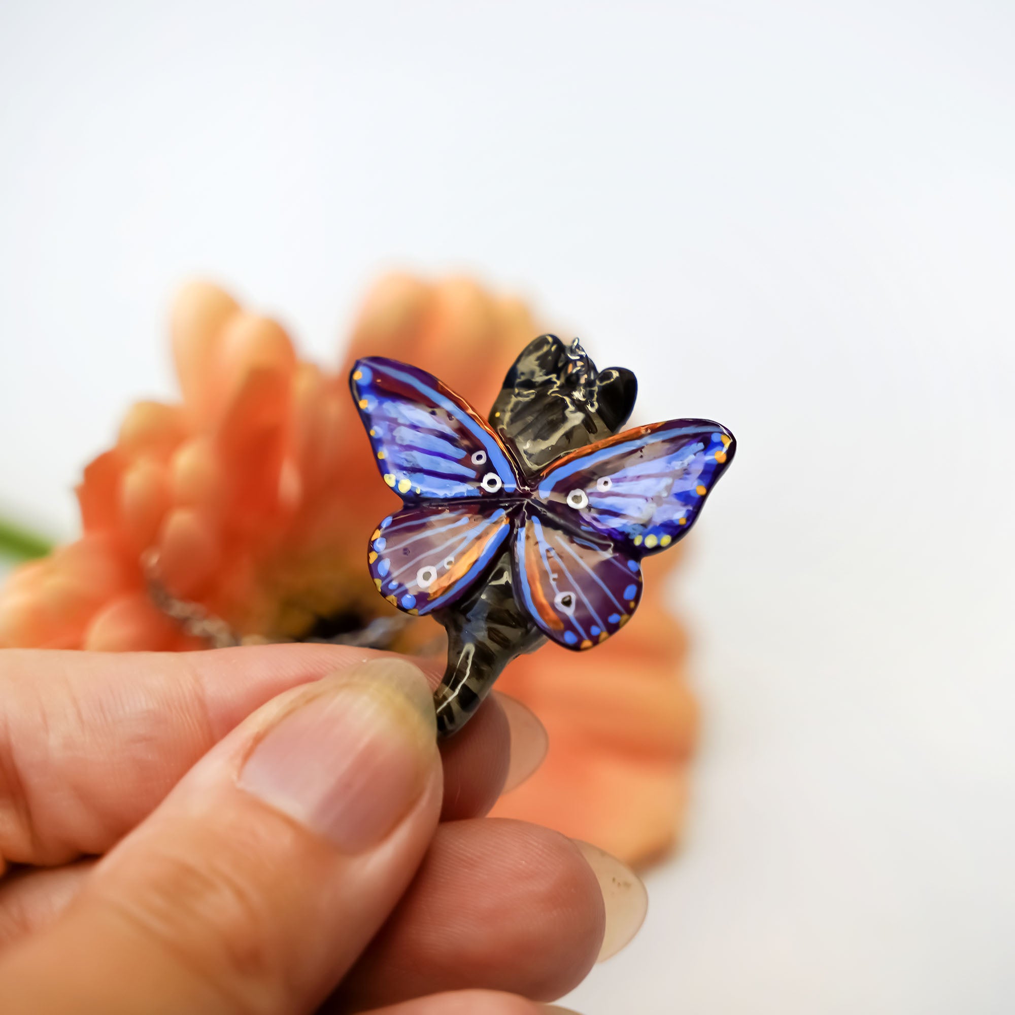 Tabby cat with moth wings pendant