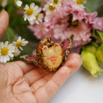Tabby Catfly with pink butterfly wings